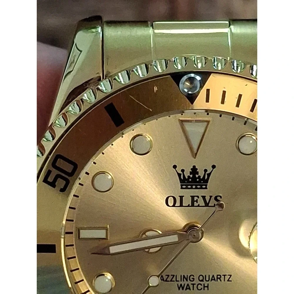 OLEVS 5885G 43mm Polished Goldtone Mens Watch,Day Indicator,Quartz Movement.